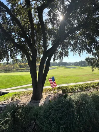 a view of swimming pool with an outdoor space and seating area