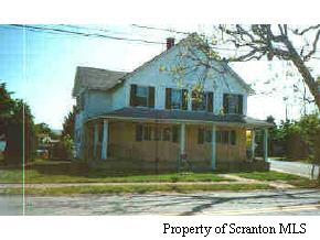 Spring Street Moosic, PA 18507 - Photo 1 of 1 a front view of a house with a yard