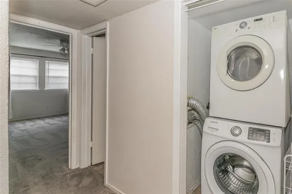 a view of a storage & utility room with washer and dryer