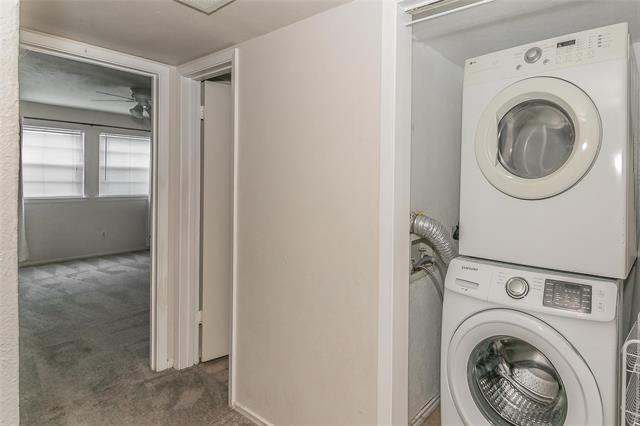 5111 Skillman Street, Unit 128 Dallas, TX 75206 - Photo 26 of 29 a view of a storage & utility room with washer and dryer