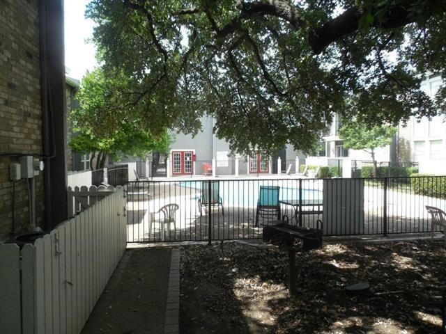 5111 Skillman Street, Unit 128 Dallas, TX 75206 - Photo 28 of 29 a view of a house with a small yard