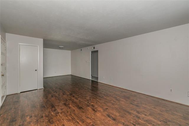 5111 Skillman Street, Unit 128 Dallas, TX 75206 - Photo 8 of 29 a view of an empty room
