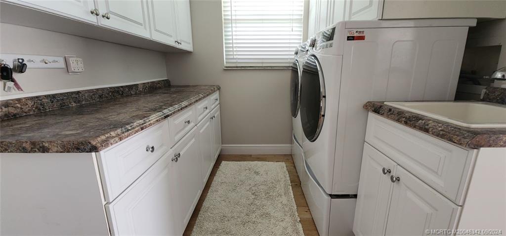 4898 Southeast Major Way Stuart, FL 34997 - Photo 16 of 28 laundry room