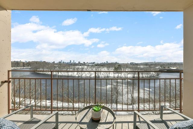 a view of a lake from a balcony