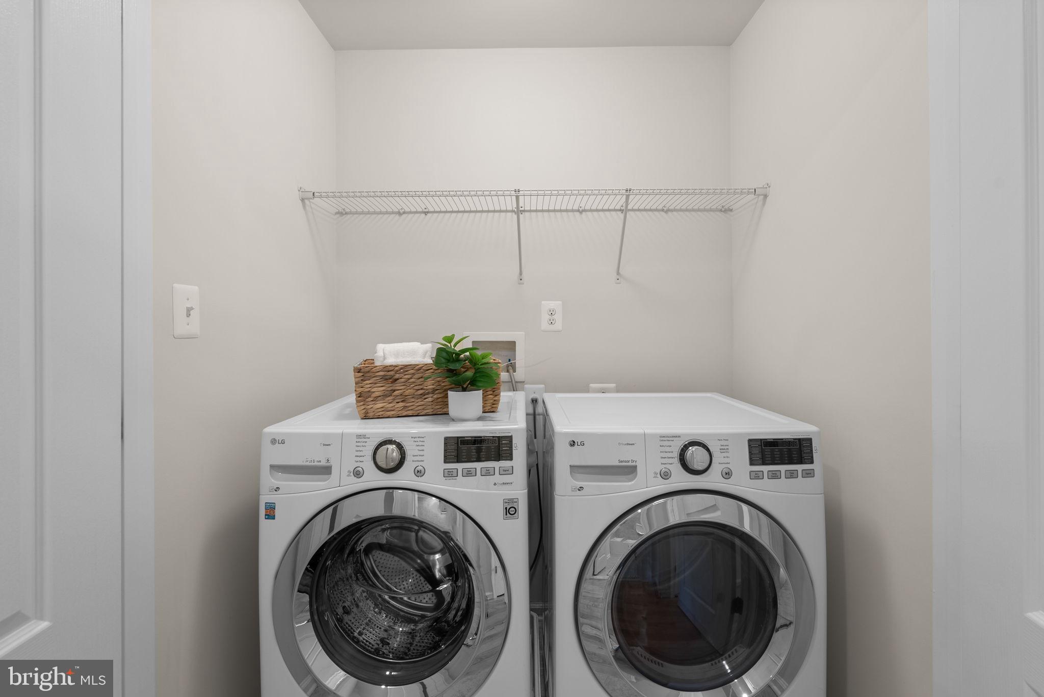 8012 Alchemy Way Elkridge, MD 21075 - Photo 31 of 46 a utility room with dryer and washer