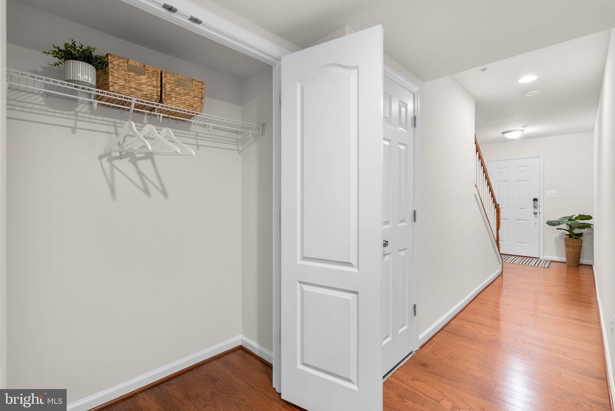 8012 Alchemy Way Elkridge, MD 21075 - Photo 37 of 46 a view of a hallway with wooden floor