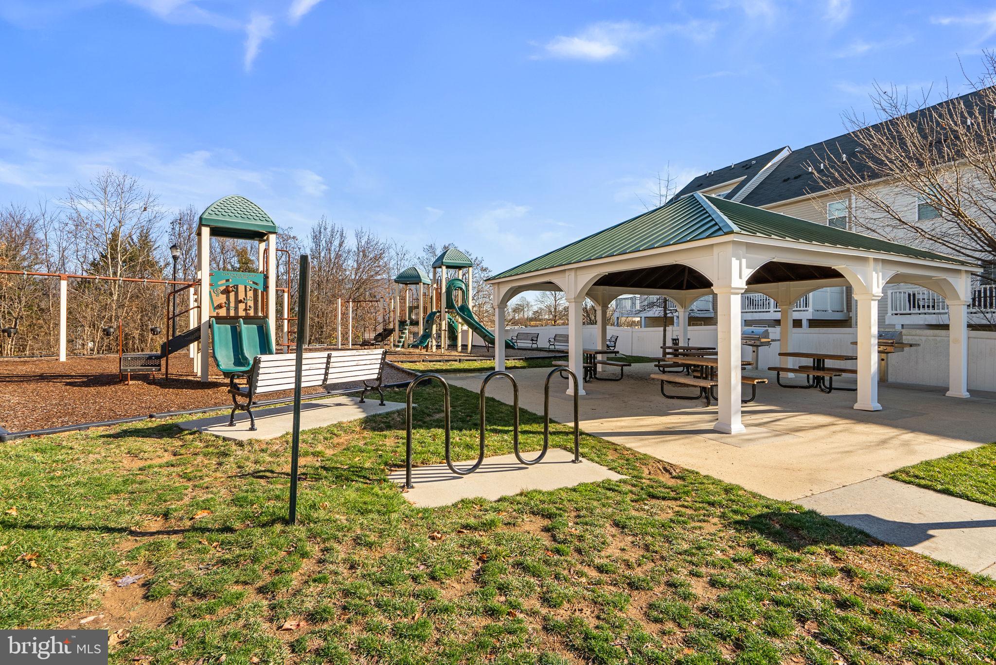 8012 Alchemy Way Elkridge, MD 21075 - Photo 40 of 46 a view of a swimming pool with a patio