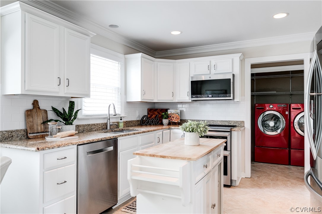 3300 East Weyburn Road Richmond, VA 23235 - Photo 22 of 46 a kitchen with a sink stove top oven and refrigerator