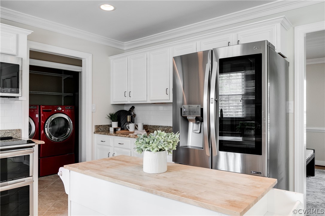 3300 East Weyburn Road Richmond, VA 23235 - Photo 24 of 46 a kitchen with a refrigerator and stove