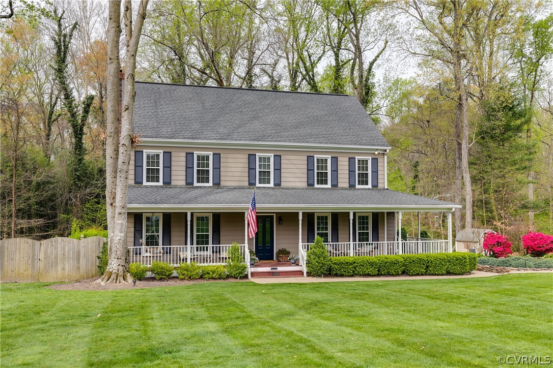 3300 East Weyburn Road Richmond, VA 23235 - Photo 3 of 46 a front view of a house with a garden