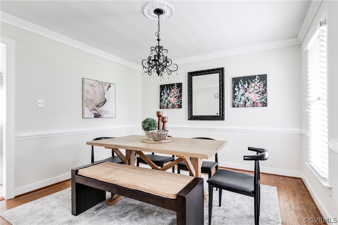 3300 East Weyburn Road Richmond, VA 23235 - Photo 31 of 46 a view of a dining room with furniture window and wooden floor