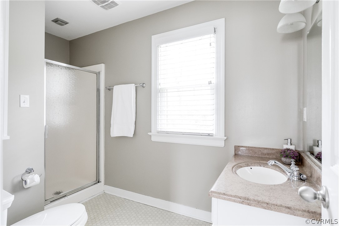 3300 East Weyburn Road Richmond, VA 23235 - Photo 37 of 46 a bathroom with a granite countertop sink and a mirror
