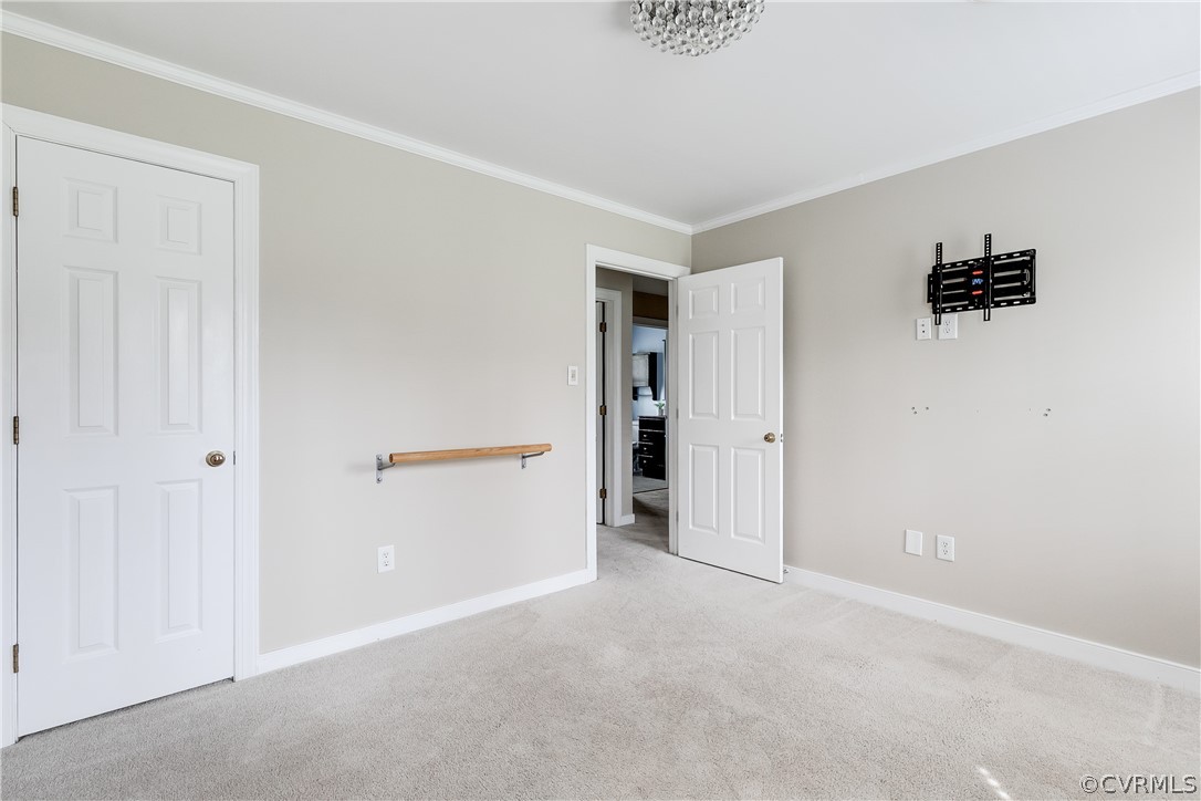 3300 East Weyburn Road Richmond, VA 23235 - Photo 40 of 46 an empty room with a door