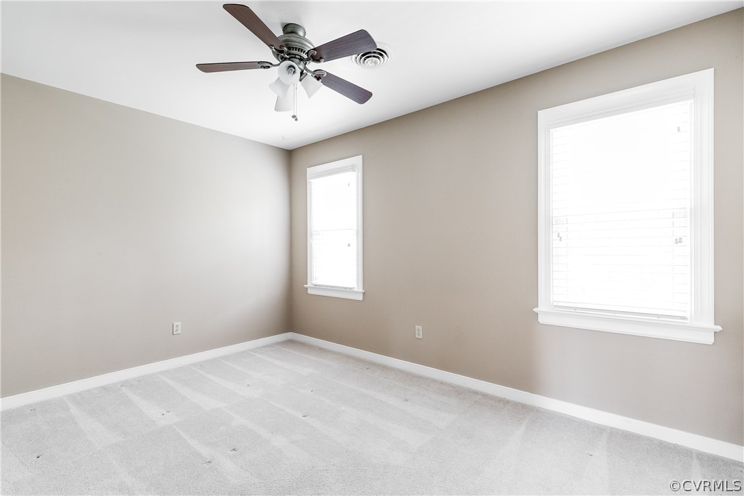 3300 East Weyburn Road Richmond, VA 23235 - Photo 41 of 46 an empty room with windows and fan