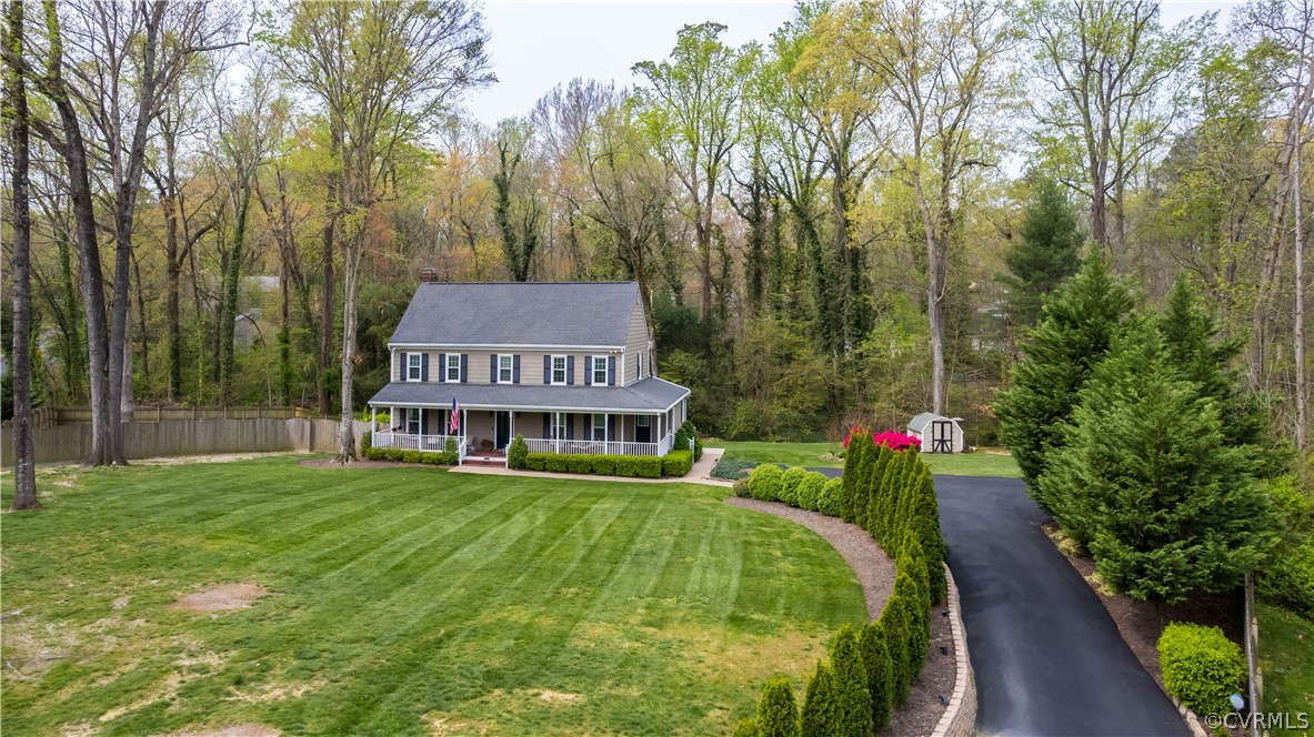 3300 East Weyburn Road Richmond, VA 23235 - Photo 44 of 46 a view of a house with a big yard and large trees