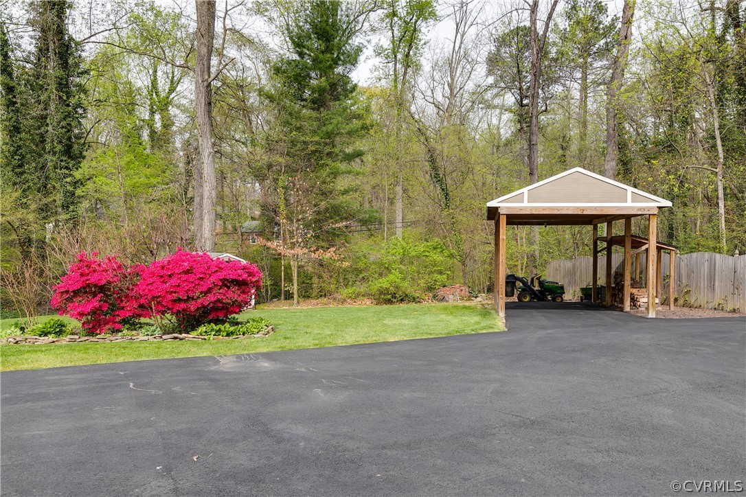 3300 East Weyburn Road Richmond, VA 23235 - Photo 7 of 46 a view of a house with a yard and sitting area