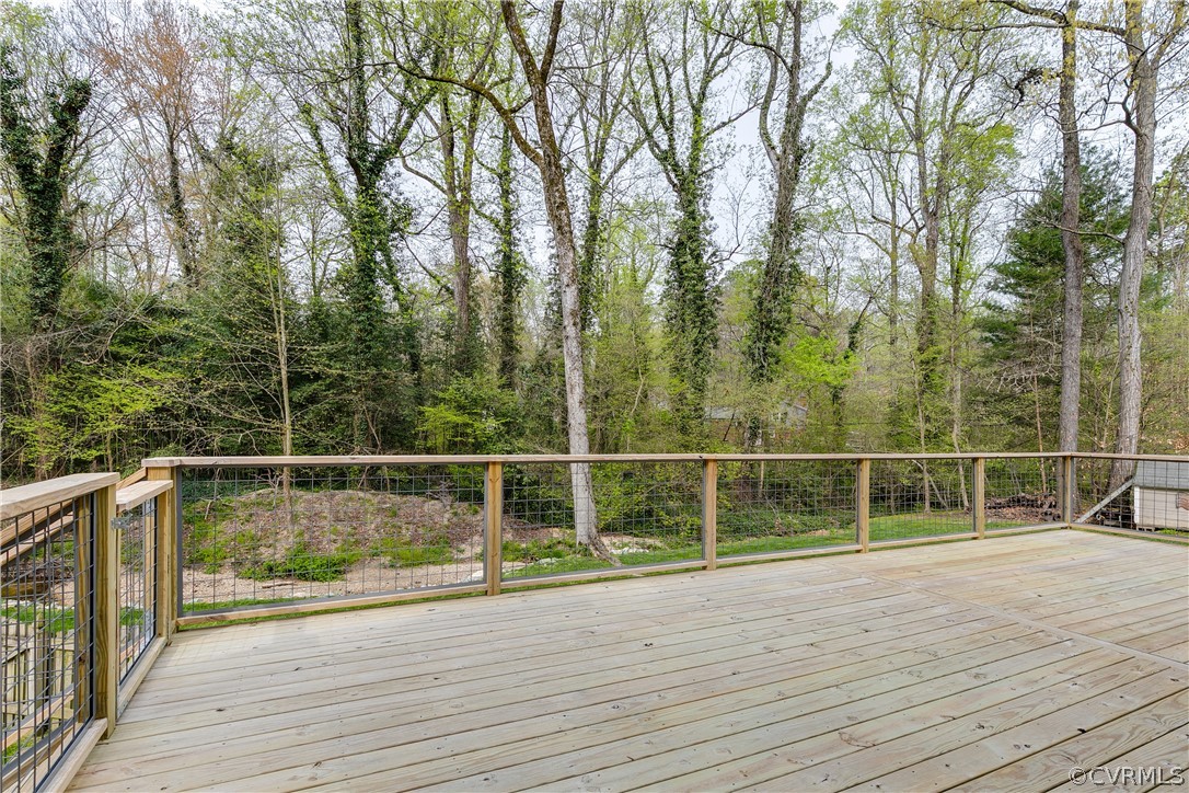 3300 East Weyburn Road Richmond, VA 23235 - Photo 10 of 46 a view of a roof deck with wooden floor and fence