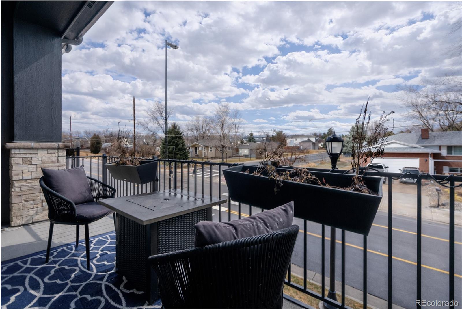 11890 West 52nd Avenue Wheat Ridge, CO 80033 - Photo 20 of 44 a view of a roof deck with furniture