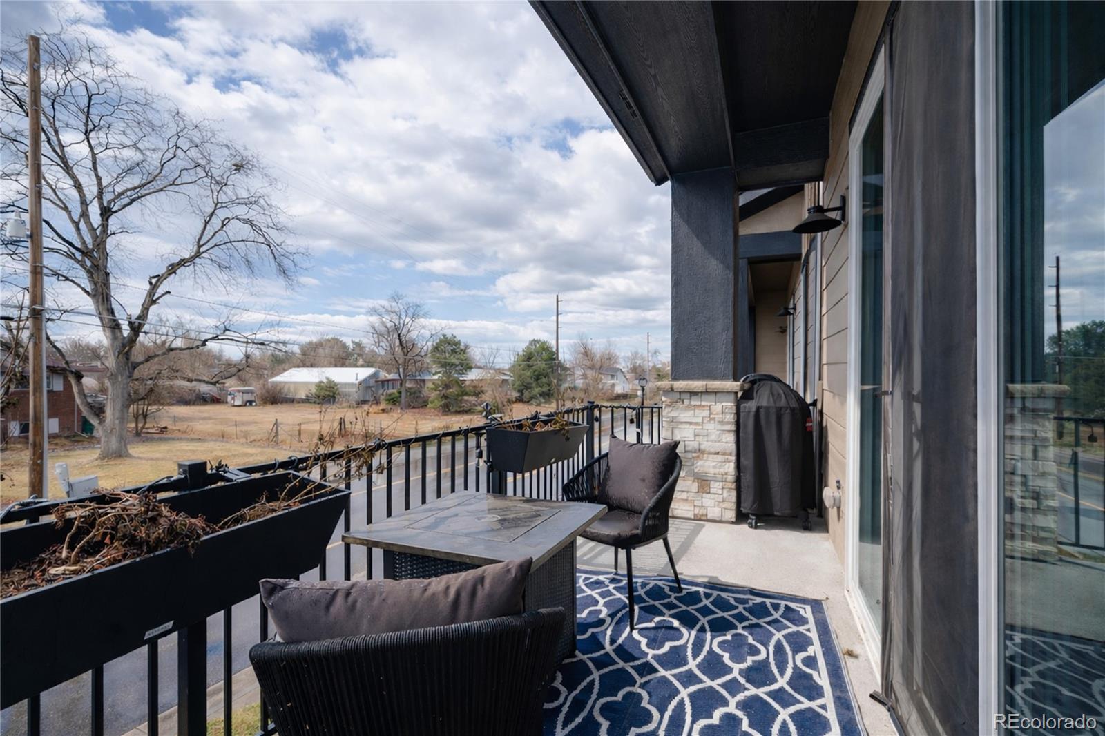 11890 West 52nd Avenue Wheat Ridge, CO 80033 - Photo 21 of 44 a view of balcony with furniture