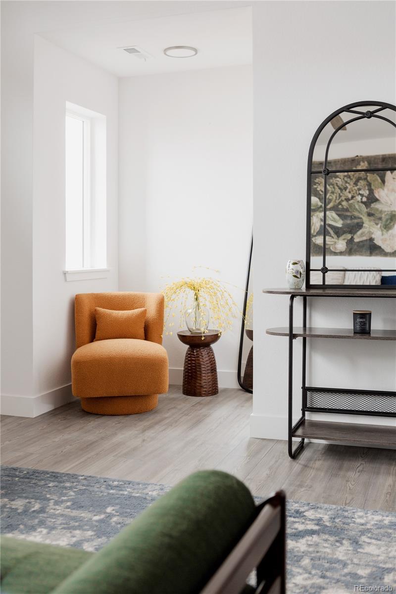 11890 West 52nd Avenue Wheat Ridge, CO 80033 - Photo 28 of 44 a bedroom with bed and window