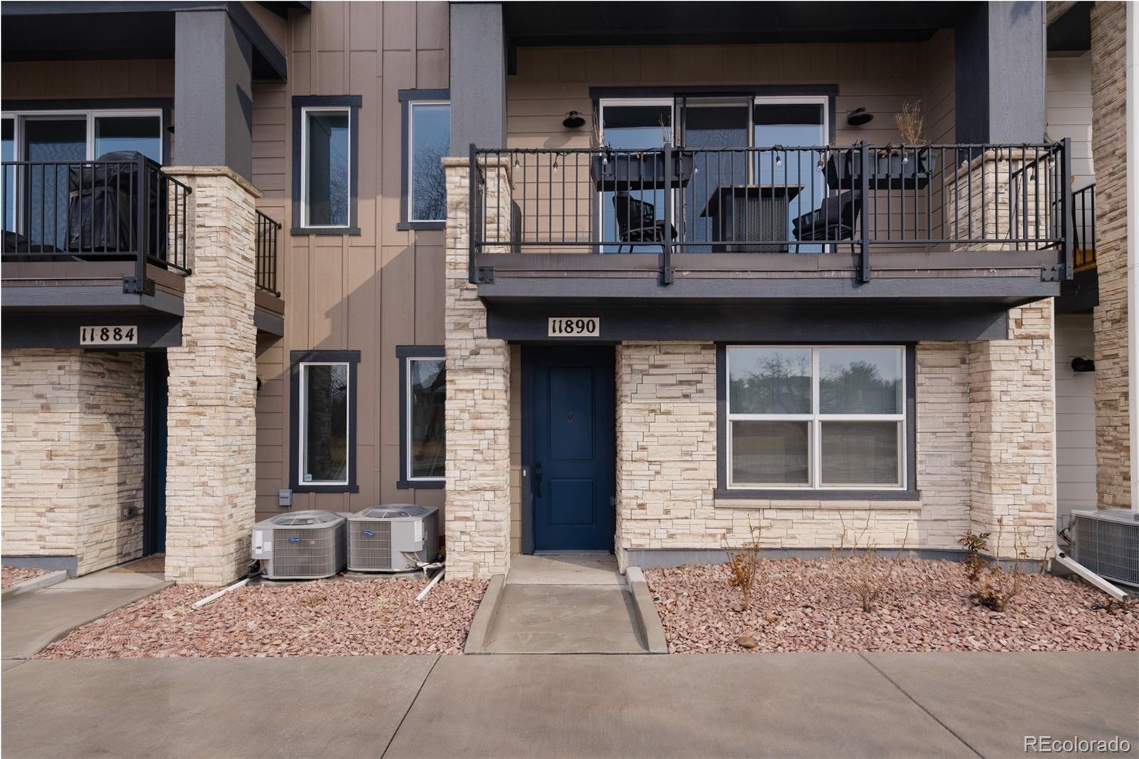 11890 West 52nd Avenue Wheat Ridge, CO 80033 - Photo 3 of 44 a house view with a outdoor space