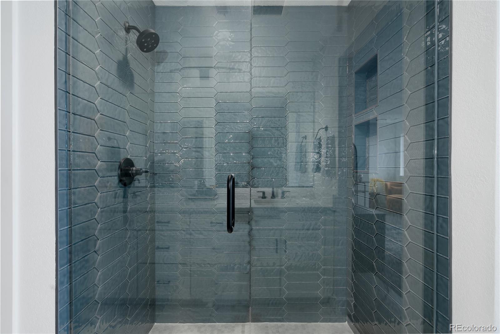 11890 West 52nd Avenue Wheat Ridge, CO 80033 - Photo 32 of 44 a bathroom with a shower