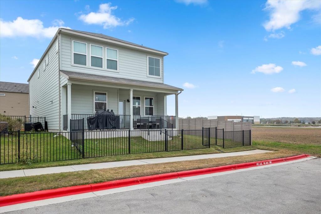 7401 Grand Linden Way, Unit 78 Austin, TX 78744 - Photo 13 of 17 a view of house and outdoor space