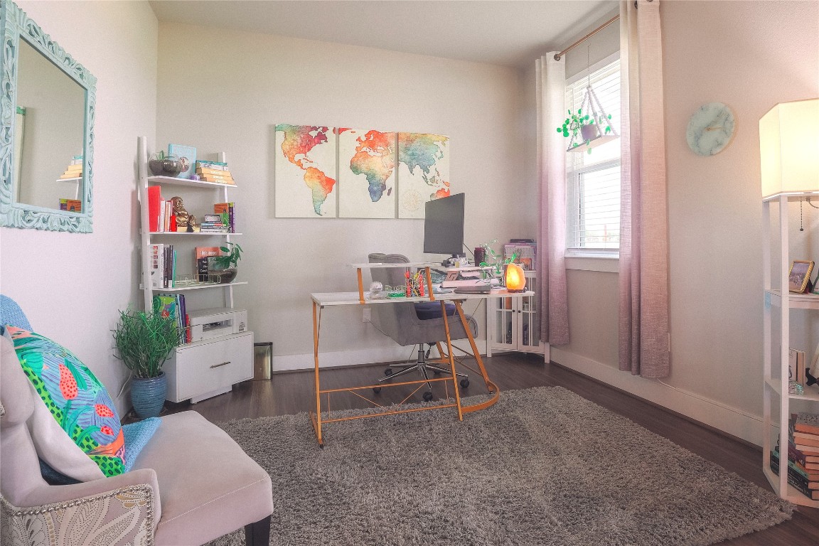 7401 Grand Linden Way, Unit 78 Austin, TX 78744 - Photo 4 of 17 a living room with furniture and a window