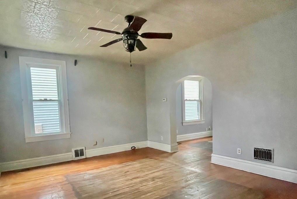 424 Ridge Avenue New Kensington, PA 15068 - Photo 3 of 15 a view of a livingroom with a ceiling fan and window