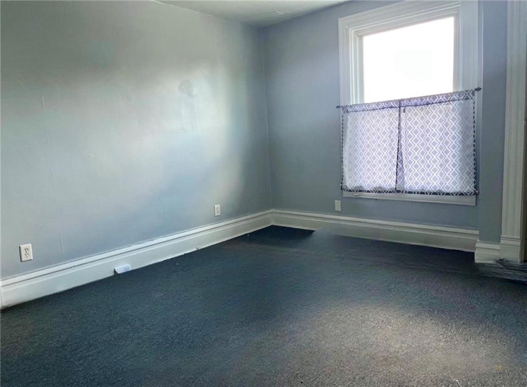 424 Ridge Avenue New Kensington, PA 15068 - Photo 10 of 15 an empty room with a window