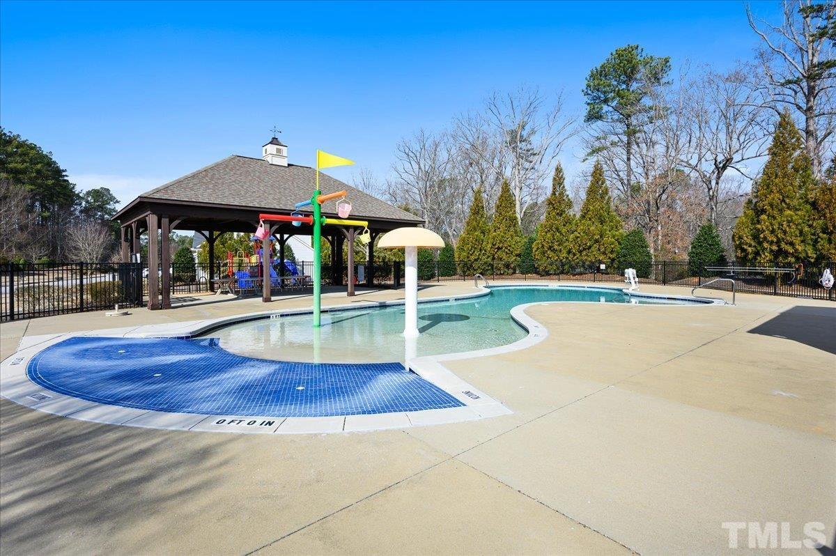 2430 Pilsley Road Apex, NC 27539 - Photo 3 of 3 a view of outdoor space with swimming pool