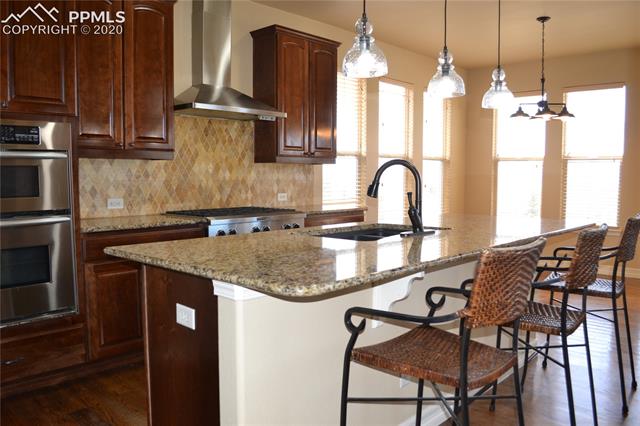 2353 Cinnabar Road Colorado Springs, CO 80921 - Photo 9 of 48 Kitchen bar