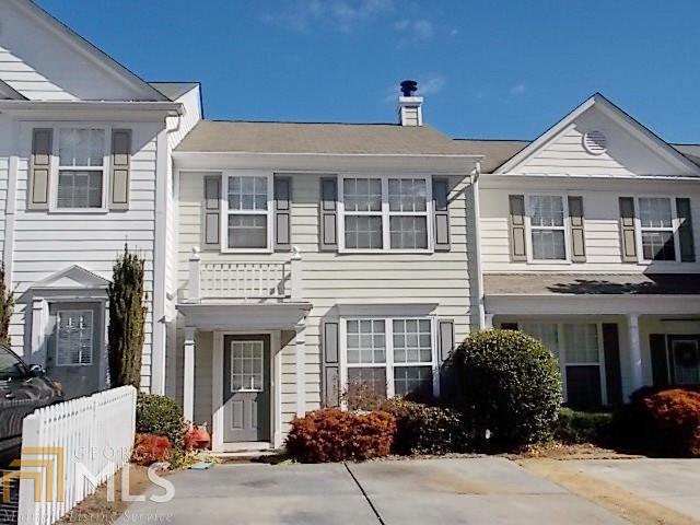 4114 Howell Park Road Duluth, GA 30096 - Photo 1 of 1 a front view of a house with lots of windows