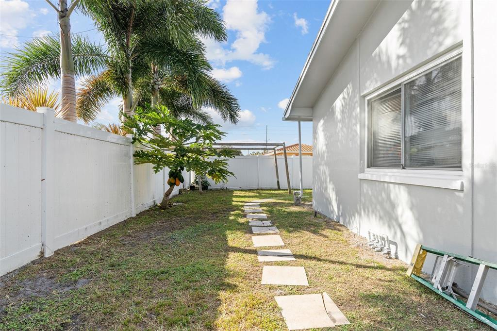2453 Roberta Street Largo, FL 33771 - Photo 25 of 28 a view of a yard with a fountain
