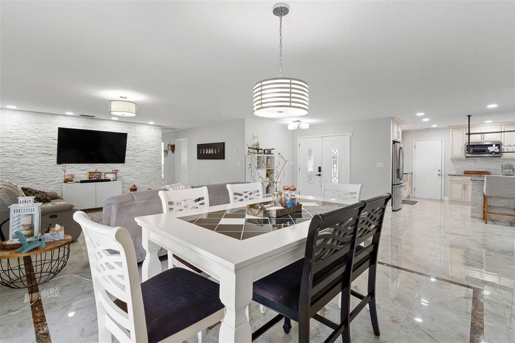 2453 Roberta Street Largo, FL 33771 - Photo 7 of 29 a view of a dining room with furniture