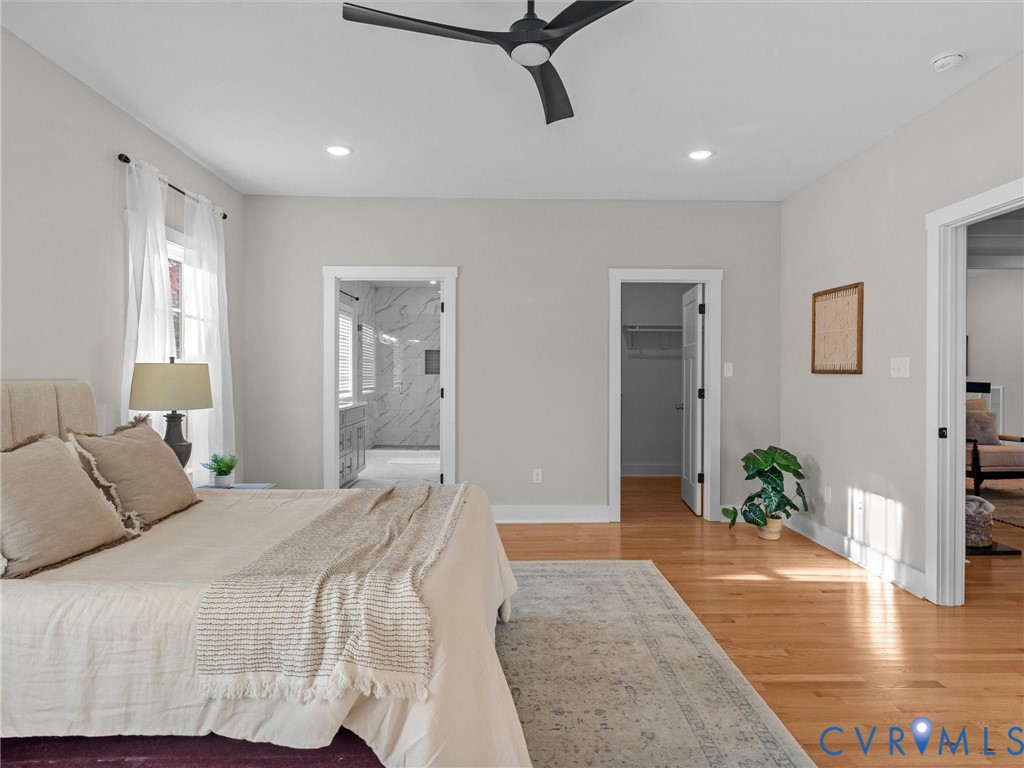 9018 Mahogany Drive Chesterfield, VA 23832 - Photo 26 of 49 Bedroom with light wood finished floors, a walk in