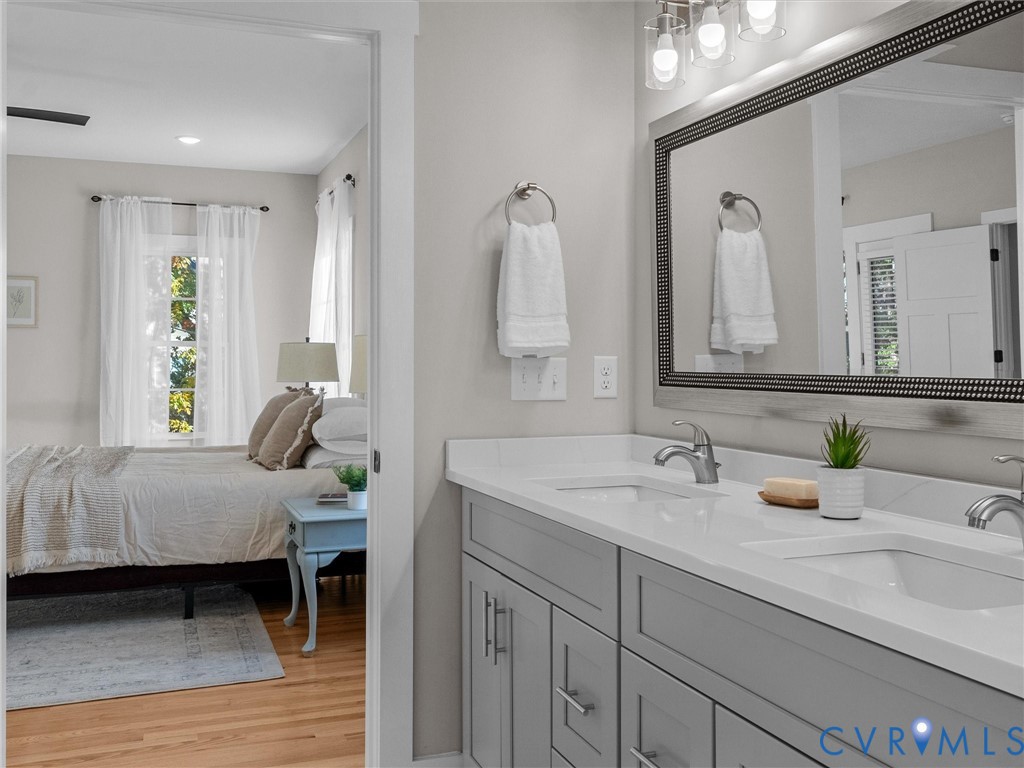 9018 Mahogany Drive Chesterfield, VA 23832 - Photo 29 of 49 Bathroom featuring double vanity and light wood fi
