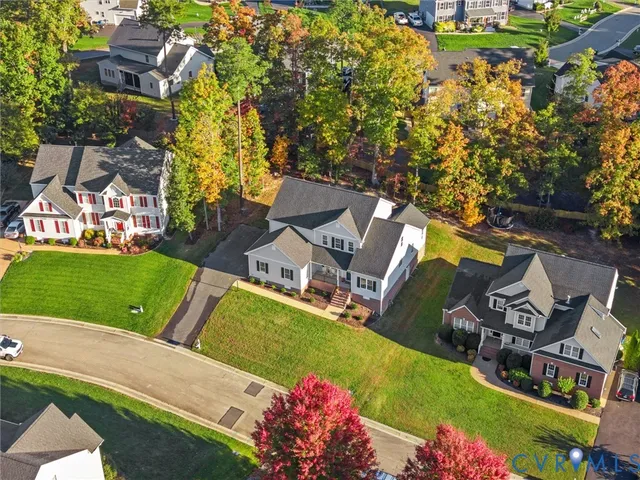 a view of a porch with furniture and a floor to ceiling window