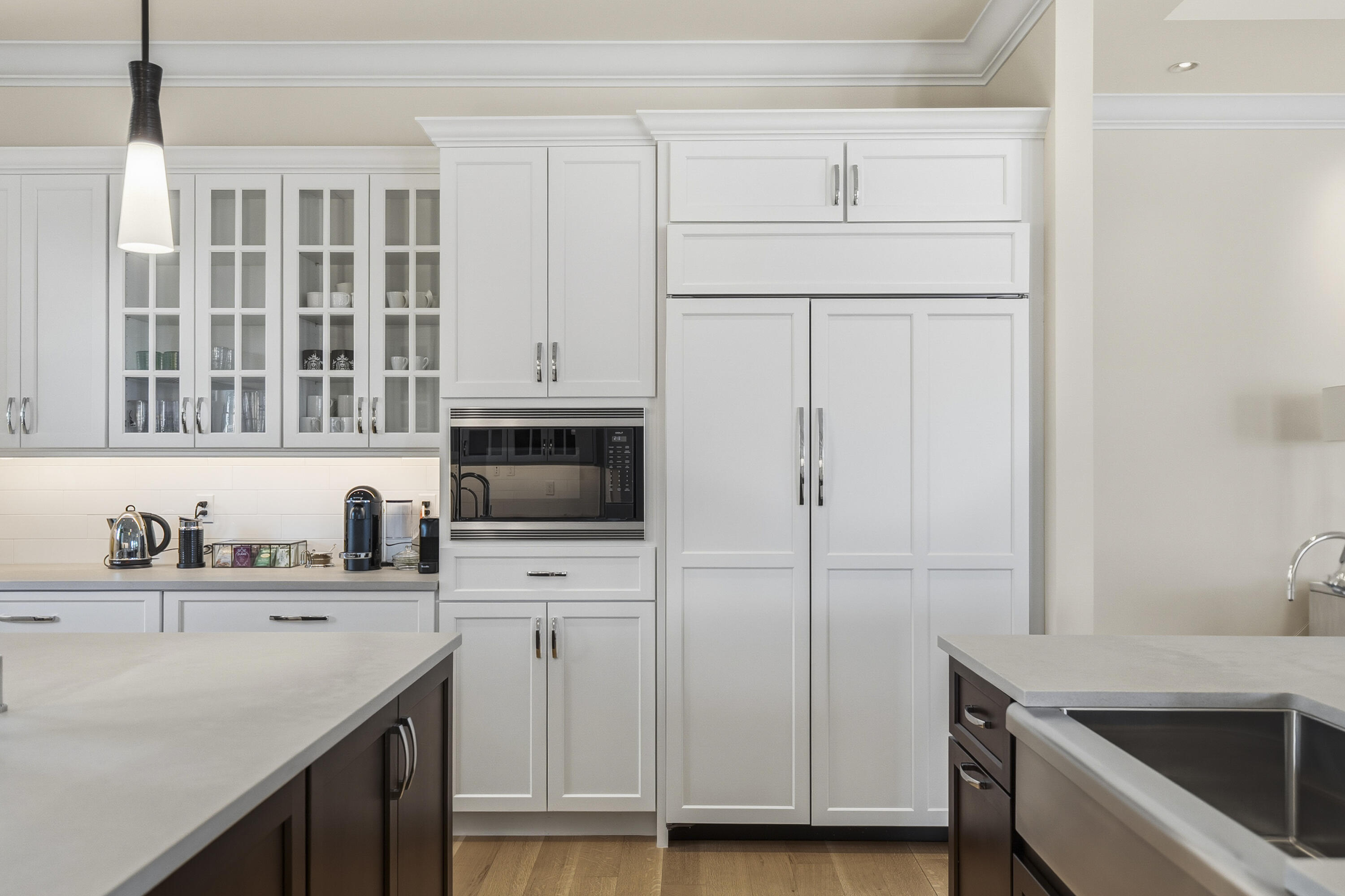 3973 Southeast Topsail Court Stuart, FL 34997 - Photo 33 of 38 a kitchen with a sink and a refrigerator