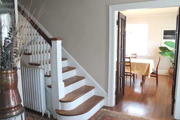2 Raymond Street Lexington, MA 02421 - Photo 2 of 18 a view of entryway and dining room with wooden floor