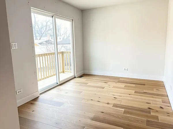 a view of an empty room and window