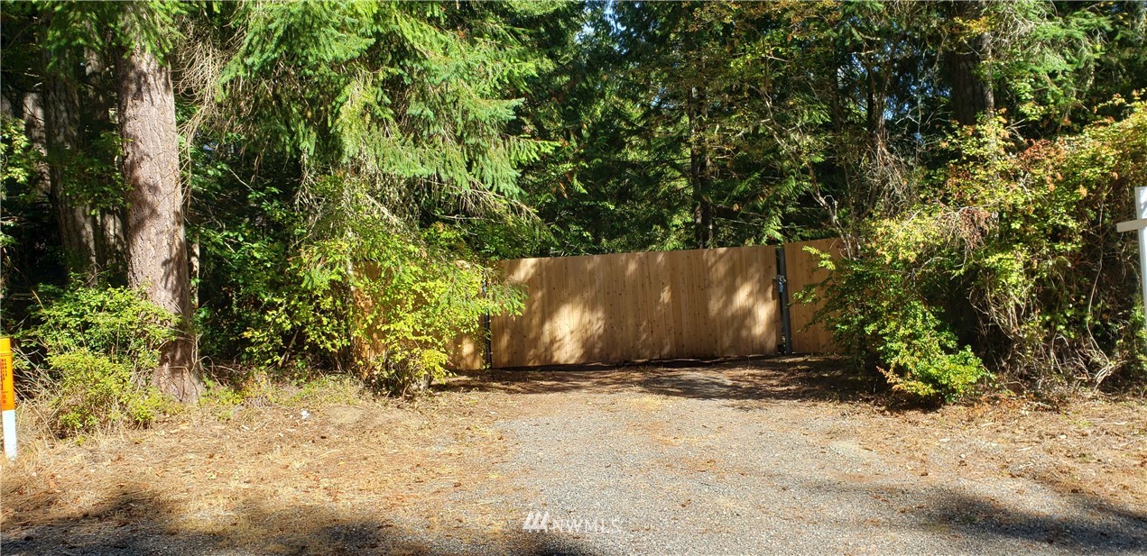 17613 Rouse Road Southwest Longbranch, WA 98351 - Photo 31 of 38 a view of outdoor space and yard