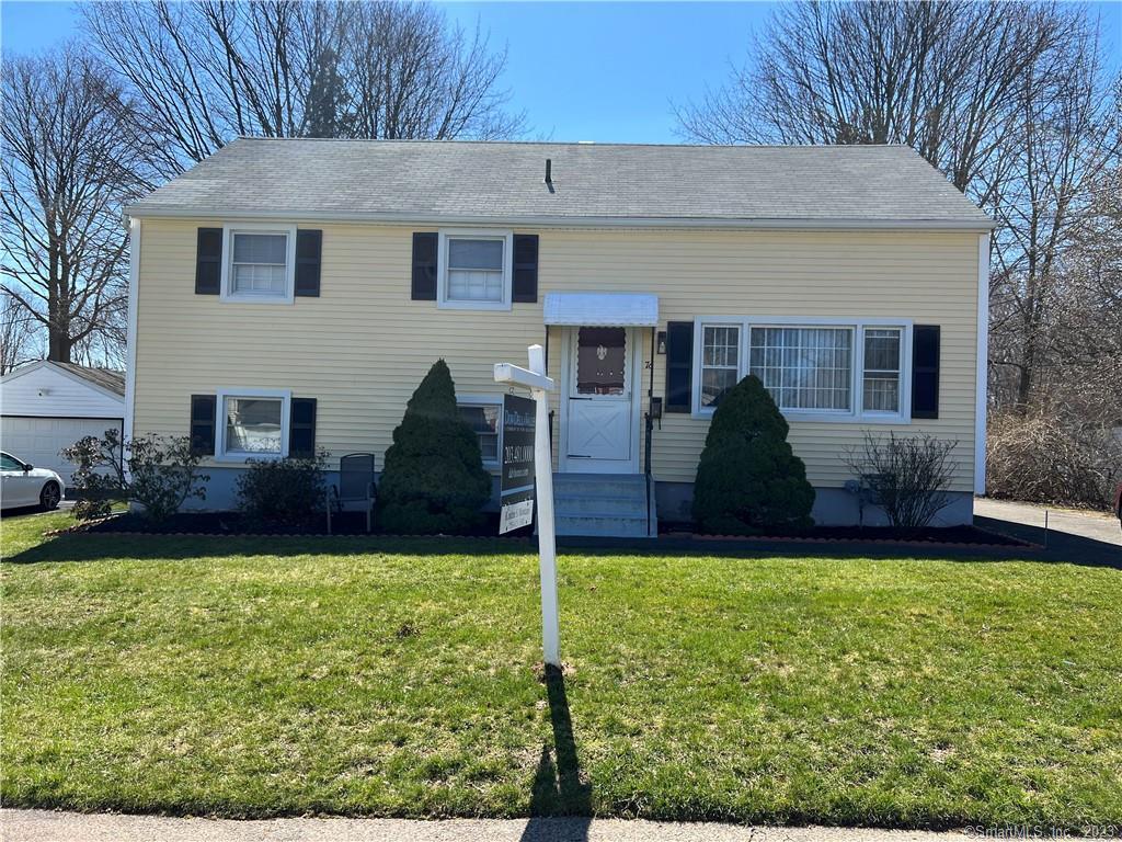 a house view with a garden space