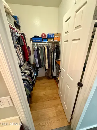 a view of a closet with storage