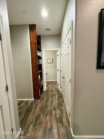a view of entryway with wooden floor