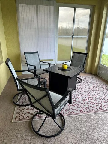 a living room with a couch and a table