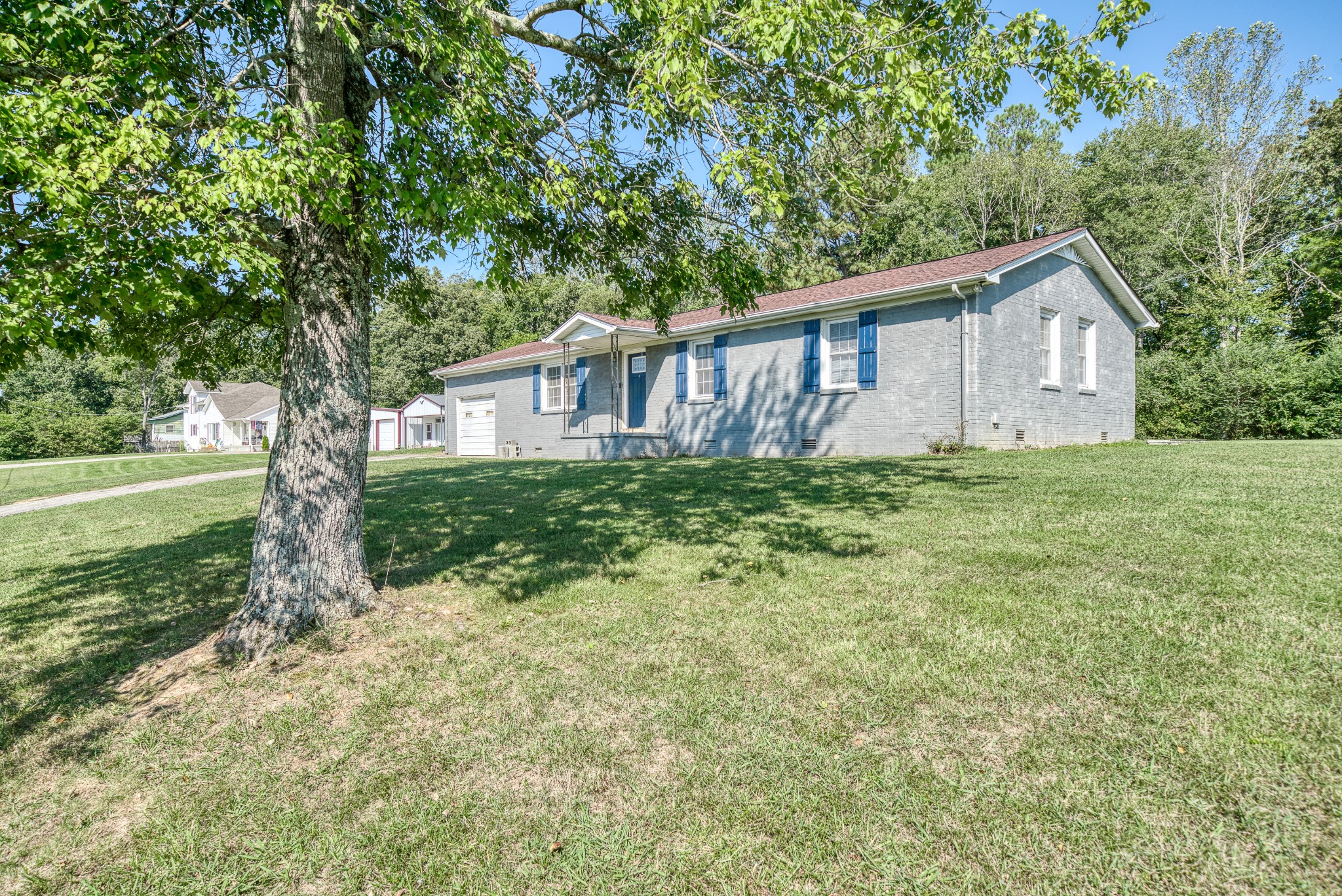 a house view with a garden space