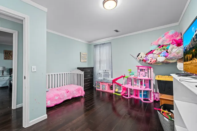 a bathroom with a toilet a sink and a mirror