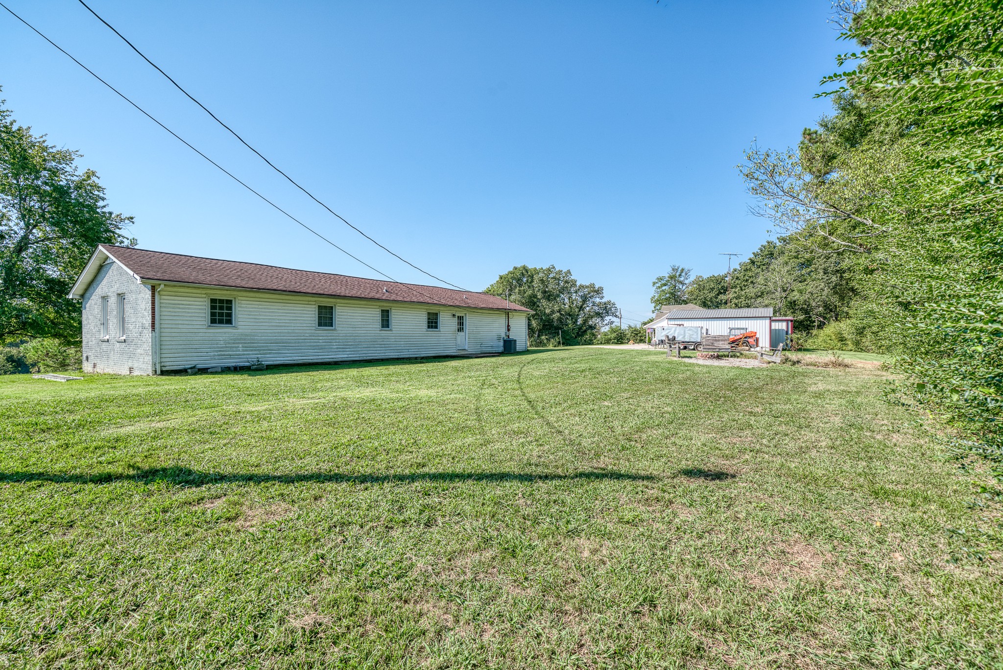 4871 New Window Cliff Road Baxter, TN 38544 - Photo 25 of 26 a view of a house with a yard