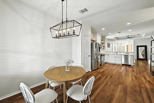a view of a dining room with furniture